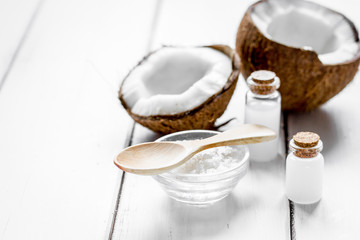 coconut oil for body care in cosmetic concept on white desk mock