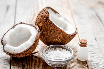 organic cosmetics concept with coconut on table background