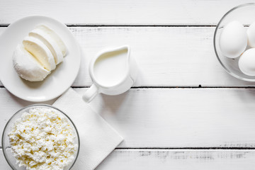Fototapeta premium monochrome concept with dairy products on white table top view m