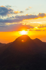 Sunset on the top of mountain colourful sky cloud