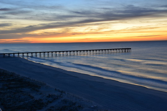 Winter sunrise in January over the Gulf of Mexico in Pensacola in the USA. © paulbriden