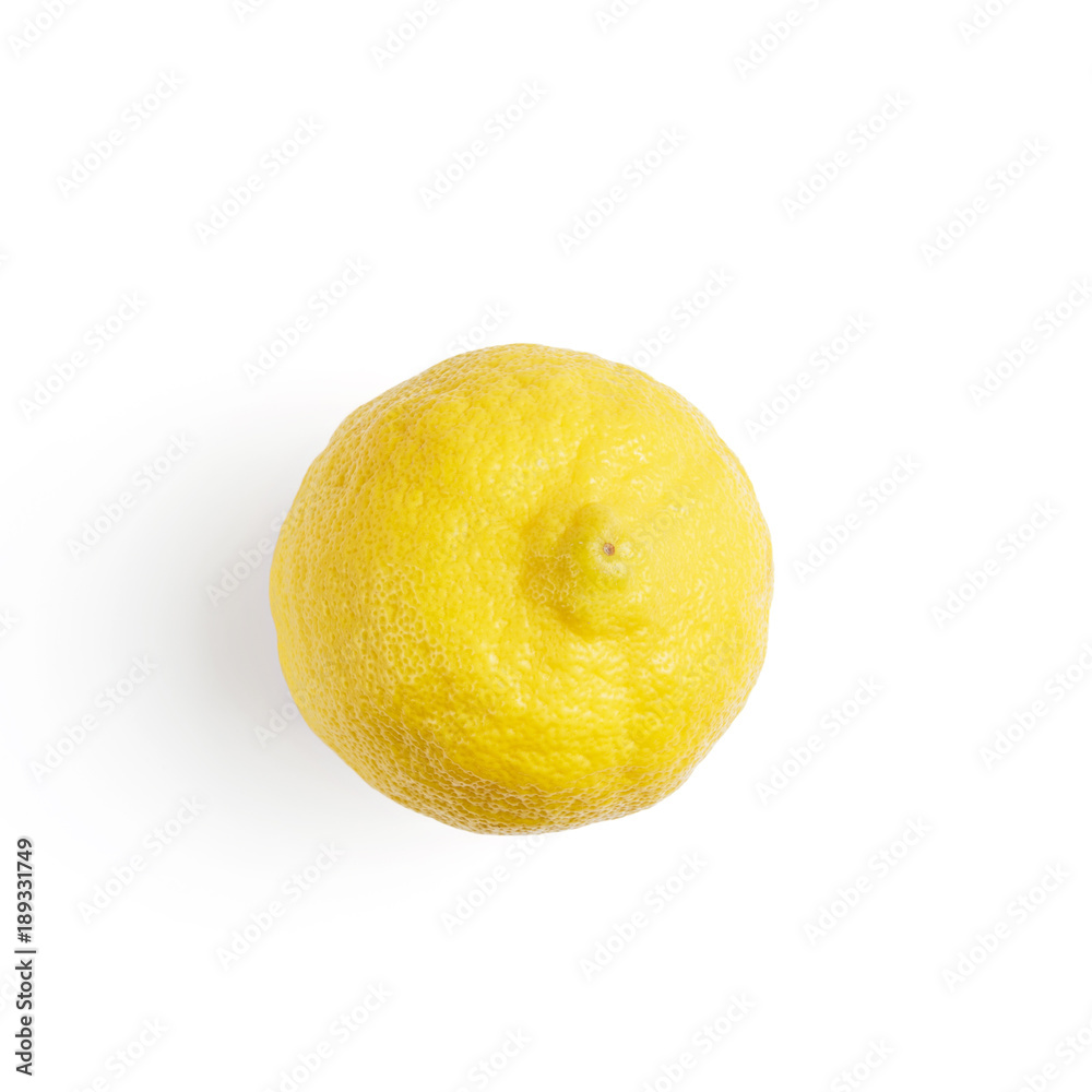 Wall mural One yellow ripe lemon fruit, isolated on a white background, top view