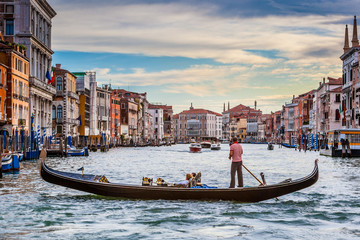 Fototapeta na wymiar Beautiful Venice Canal With Gondola Tour