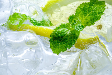 Lemon drop in fizzy sparkling water, juice refreshment
