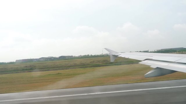 Airplane takes off during the rain
