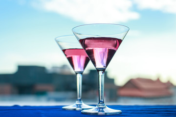 wine glasses with blue sky