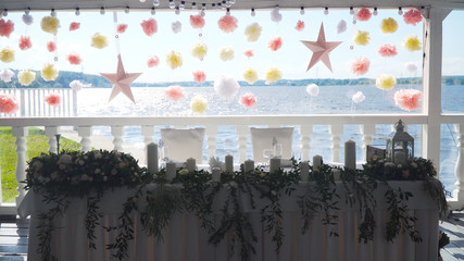 Wedding decorations. Wedding Ceremony Scene. Paper decorative applique