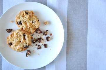 Top view of Chocolate and Macadamia Cookies on White Plate