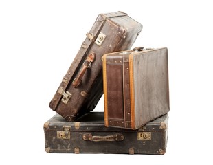 Old suitcases isolated on white background