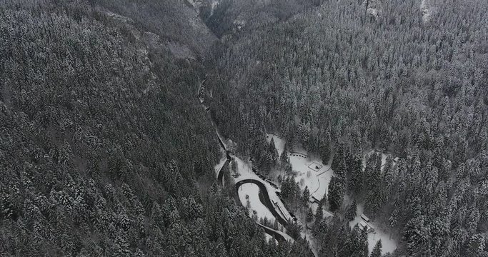Cars On A Serpentine Road In Bicaz Mountains Romania
