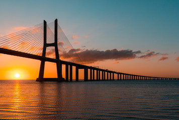 Obraz premium Vasco da Gama Bridge at sunrise, Lisbon, Portugal