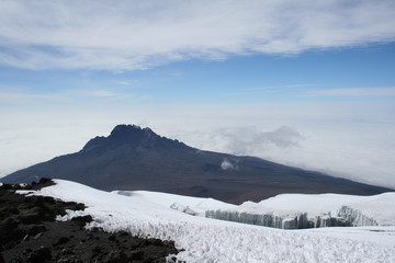 Fototapeta na wymiar mountain peak beyond snow