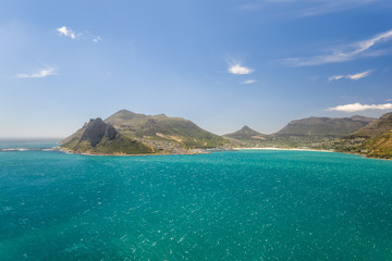 Obraz premium Beautiful view of Hout Bay seen from Chapman's Peak Drive between Hout Bay and Noordhoek near Cape Town, South Africa. Chapman's Peak Drive is a famous day trip for Cape Town tourists.