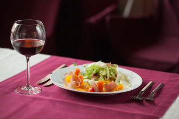 A glass of wine with a meal in the restaurant