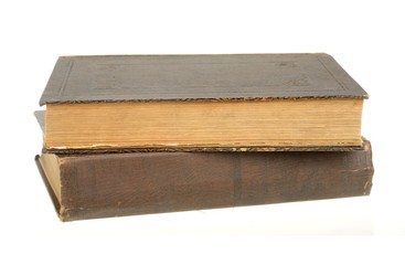 Two old books isolated on white background