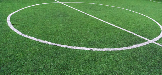 Fototapeta na wymiar Soccer field with textured grass