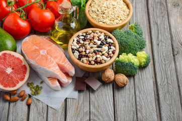 Selection of food that is good for the heart, rustic wooden background, selective focus