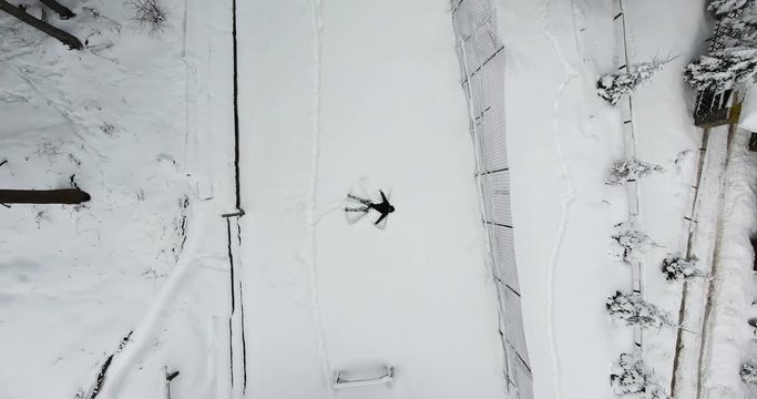 Making A Snow Angel Aerial Top View