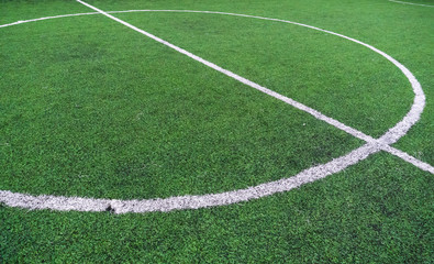 Fototapeta na wymiar Soccer field with textured grass