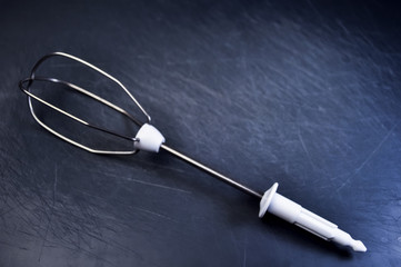 Whisk for cooking food and cooking for women. Women's work in th