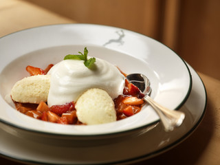 strawberries dessert wil ice cream and biscuits