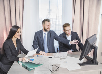 three businessmen at the meeting to communicate