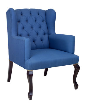French blue wingback armchair with dark brown wooden legs isolated on white background including clipping path