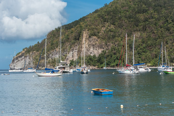 Fototapeta na wymiar Basse Terre island in Guadeloupe, panorama, the harbor in the bay with sailboats, marina 
