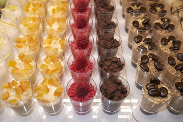 Small glasses with ice cream dessert