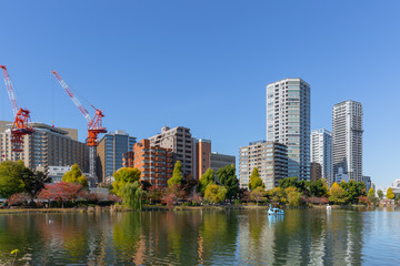 Fototapeta na wymiar Ueno lake park in tokyo cityscape summer day blue sky