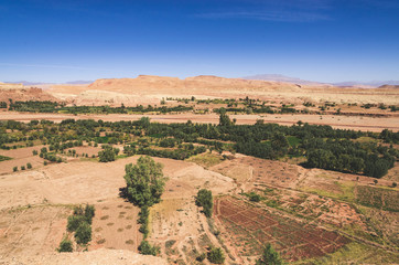 Fototapeta na wymiar Desert landscape with Atlas Mountains near Kasbah Ait Ben Haddou, Morocco