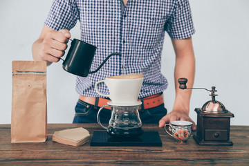 Men Barista coffee drip set on the table