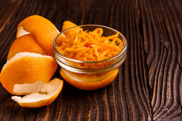 oranges and juice on a wooden background