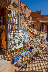 Narrow streets of Kasbah Ait Ben Haddou with traditional moroccan souvenirs, Morocco