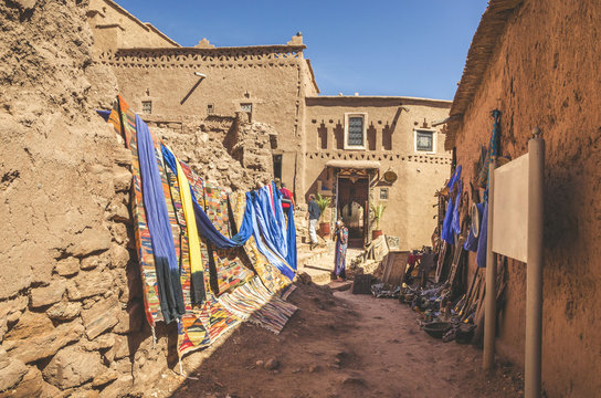 Narrow streets of Kasbah Ait Ben Haddou with traditional moroccan souvenirs, Morocco
