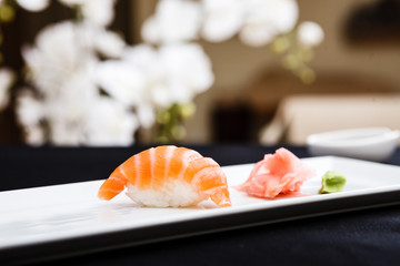 Salmon sushi served on a plate