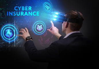 Business, Technology, Internet and network concept. Young businessman working on a virtual screen of the future and sees the inscription: Cyber insurance