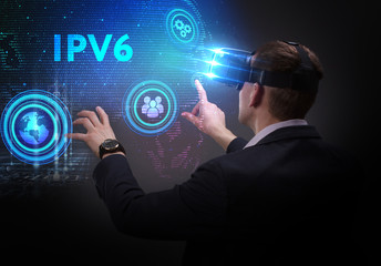 Business, Technology, Internet and network concept. Young businessman working on a virtual screen of the future and sees the inscription: IPv6