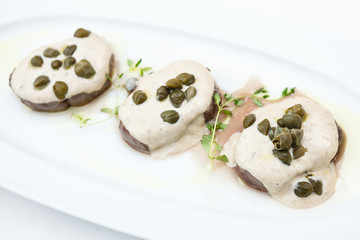 Sliced veal with sauce