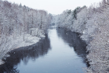 Obraz na płótnie Canvas Morrum river in snowy winter, Sweden