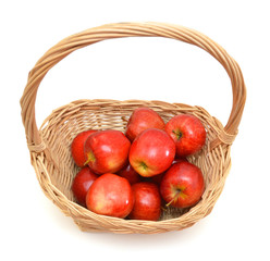 ripe apples in basket on a white background