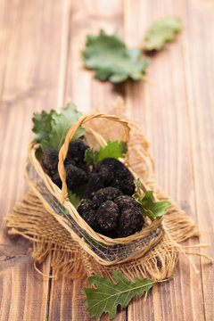 Black truffles in basket.