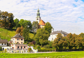 Cityscape of the Salzach river and the old city in center of Salzburg, Austria