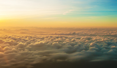 Fototapeta na wymiar white fluffy clouds at sunrise