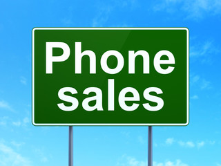 Marketing concept: Phone Sales on green road highway sign, clear blue sky background, 3D rendering