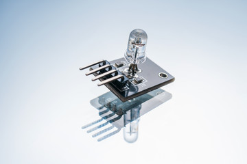 electronic micro detail on white background. component for robotics creation. technology innovation.