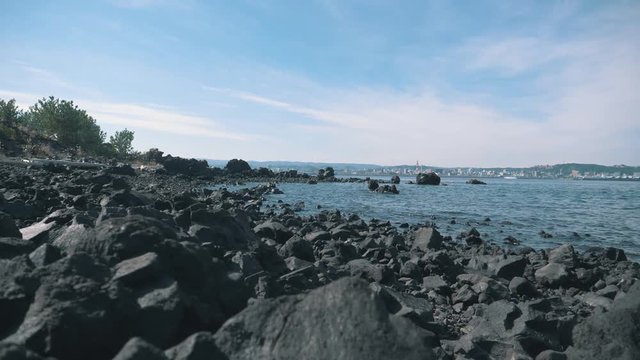 Volcano black rocks beach. Sakurajima, Japan
