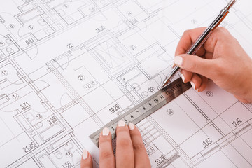 Architect drawing architectural project closeup
