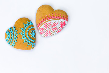 Heart shaped cookies for valentine day on a white background. Top view, copy space