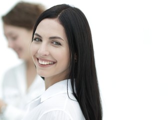 Obraz premium close-up of a beautiful woman manager and co-workers in the office
